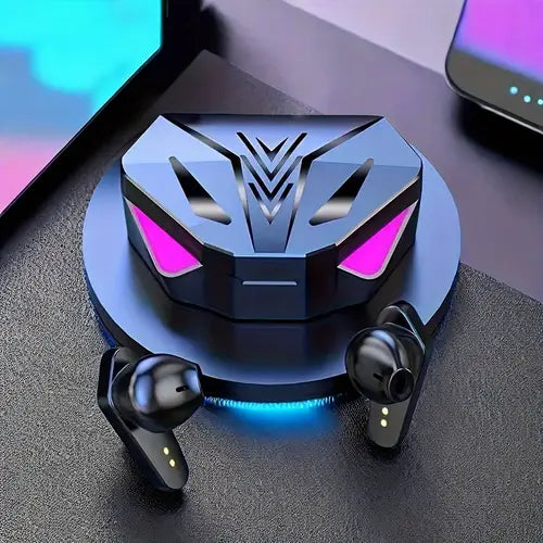 Wireless HiFi gaming headphones by Od Kuby placed on table next to smartphone, ideal for gaming and voice recording